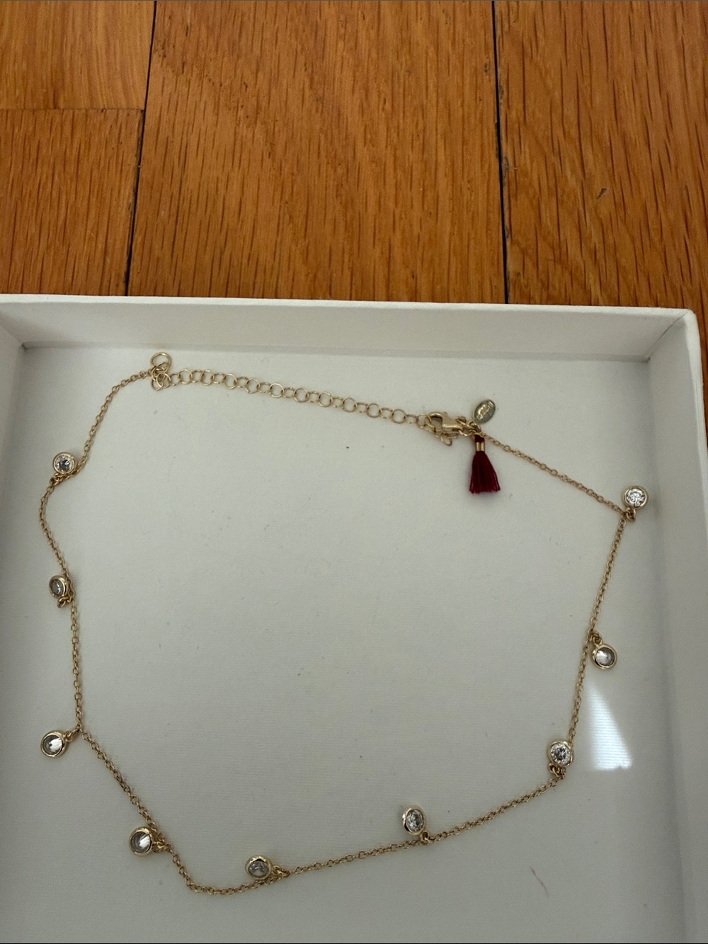 Shashi Delicate Gold tone over Sterling Silver (925) Crystal Station Necklace